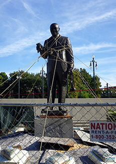 Cory Doctorow, Roped-up Satchmo statue, Louis Armstrong Park, New Orleans, Louisiana, 2010.  Area closed off since contractors poured pavement with bad cement and damaged the statue. Cory Doctorow, Roped-up Satchmo statue, Louis Armstrong Park, New Orleans, Louisiana, 2010.  Area closed off since contractors poured pavement with bad cement and damaged the statue.