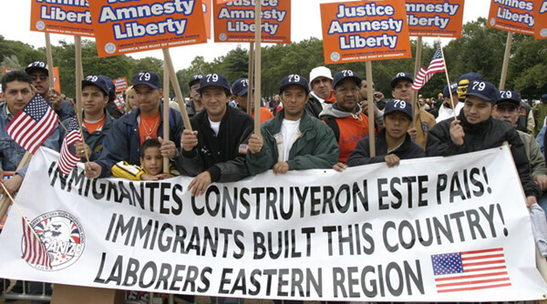 Stan Schnier, Immigrant workers at the final celebration of the Immigrant Workers Freedom Ride, Flushing Meadows Corona Park, New York, New York, October 4, 2003.   Stan Schnier, Immigrant workers at the final celebration of the Immigrant Workers Freedom Ride, Flushing Meadows Corona Park, New York, New York, October 4, 2003.