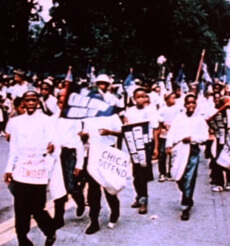 Bud Billiken parade in "simulated newsreel," from Goin' to Chicago, 2000. Bud Billiken parade in "simulated newsreel," from Goin' to Chicago, 2000.