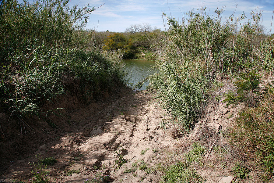 Susan Harbage Page, Looking across the Rio Grande to Mexico, near Brownsville, Texas, 2010. Susan Harbage Page, Looking across the Rio Grande to Mexico, near Brownsville, Texas, 2010.