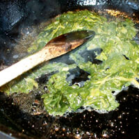 Allison O. Adams, Sauteeing poke in bacon grease, Decatur, Georgia, 2010. Allison O. Adams, Sauteeing poke in bacon grease, Decatur, Georgia, 2010.