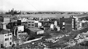 Old Smithsonian Institution Building (now known as the "Castle"), in upper left, viewed from downtown Washington. Washington Canal visible in upper right.  c. 1855. Courtesy of Smithsonian Institution Archives. Old Smithsonian Institution Building (now known as the "Castle"), in upper left, viewed from downtown Washington. Washington Canal visible in upper right.  c. 1855. Courtesy of Smithsonian Institution Archives.