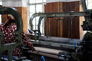 Mary E. Frederickson, Draper automatic loom, Margilan, Uzbekistan, 2006.  Mary E. Frederickson, Draper automatic loom, Margilan, Uzbekistan, 2006.