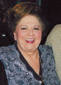 Vestal Goodman, 2001. Goodman's "style of adornment," overtly emotional and bombastic style of singing, and lyrics that resonated with the plight of many queer gospel fans, made her an icon. Vestal Goodman, 2001. Goodman's "style of adornment," overtly emotional and bombastic style of singing, and lyrics that resonated with the plight of many queer gospel fans, made her an icon.
