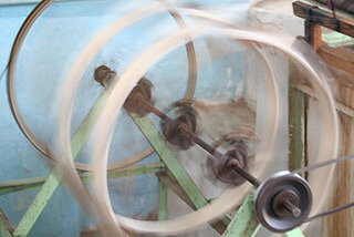 Mary E. Frederickson, Spinning silk thread, Margilan, Uzbekistan, 2006. Mary E. Frederickson, Spinning silk thread, Margilan, Uzbekistan, 2006.