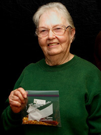 John Hammer, Willodean Smyth with her family heirloom variety Pencil Cob Corn, Ozark Seed Swap, Mountain View, Arkansas, 2009. John Hammer, Willodean Smyth with her family heirloom variety Pencil Cob Corn, Ozark Seed Swap, Mountain View, Arkansas, 2009.