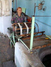 Mary E. Frederickson, Winding skeins of silk, Margilan, Uzbekistan, 2006. Mary E. Frederickson, Winding skeins of silk, Margilan, Uzbekistan, 2006.