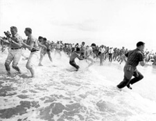 Figure 54. Segregationists trying to prevent blacks from swimming at a "white only" beach in St. Augustine, St. Augustine, Florida, 1964. Courtesy of the State Archives of Florida. Figure 54. Segregationists trying to prevent blacks from swimming at a "white only" beach in St. Augustine, St. Augustine, Florida, 1964. Courtesy of the State Archives of Florida.