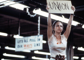 In a film based on the Stevens campaign, Norma Rae (Sally Fields) holds up a sign to unionize, from Norma Rae, 1979.  In a film based on the Stevens campaign, Norma Rae (Sally Fields) holds up a sign to unionize, from Norma Rae, 1979.