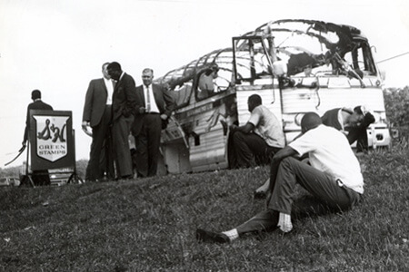 Joseph Postiglione, Freedom Riders' bus after attack in Anniston, Alabama, 1961. Courtesy of Birmingham Civil Rights Institute Joseph Postiglione, Freedom Riders' bus after attack, 1961