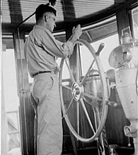 Russell Lee, Library of Congress, Prints & Photographs Division FSA-OWI Collection Reproduction Number: LC-USF33-011806-M4 DLC, Tugboat captain on Mississippi River, 1938.  Russell Lee, Library of Congress, Prints & Photographs Division FSA-OWI Collection Reproduction Number: LC-USF33-011806-M4 DLC, Tugboat captain on Mississippi River, 1938.