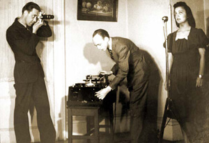 Stetson Kennedy, Robert Cook (with camera) and Stetson Kennedy (with recording equipment) documenting Edith Ogden-Aguilar Kennedy, Ybor City, Florida, 1939. Stetson Kennedy Papers Stetson Kennedy, Robert Cook (with camera) and Stetson Kennedy (with recording equipment) documenting Edith Ogden-Aguilar Kennedy, Ybor City, Florida, 1939.