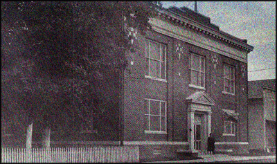 The  headquarters of the Eastern Shore of Virginia Produce Exchange stood  adjacent to the rail yard in Onley. "Do not make the mistake of  supposing that Baltimore can ever become the distributing point for  Eastern Shore goods," the general manager of the Exchange warned a  Baltimore reporter. "The little country town of Onley, Va., is now  the distributing point and will be such so far as man can see into the  future. Don't you know, sir, that we can get as good rates from this  point as Baltimore or Philadelphia or New York can possibly get?" The headquarters of the Eastern Shore of Virginia Produce Exchange  stood adjacent to the rail yard in Onley. "Do not make the mistake  of supposing that Baltimore can ever become the distributing point for  Eastern Shore goods," the general manager of the Exchange warned a  Baltimore reporter. "The little country town of Onley, Va., is now  the distributing point and will be such so far as man can see into the  future. Don't you know, sir, that we can get as good rates from this  point as Baltimore or Philadelphia or New York can possibly get?"