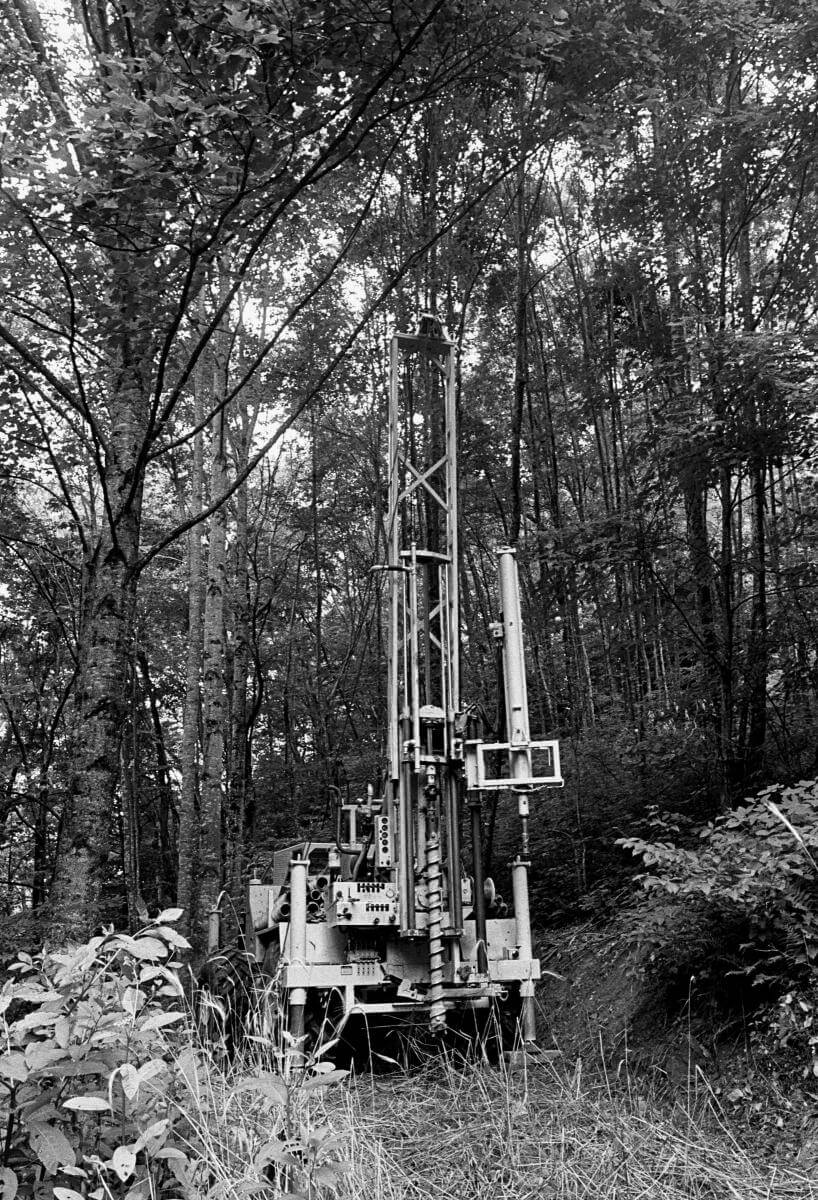 Drill rig preparing to take core rock samples from the proposed right-of-way to I-26, Sprinkle Creek, NC. Photo courtesy of Rob Amberg. javascript:void(0)