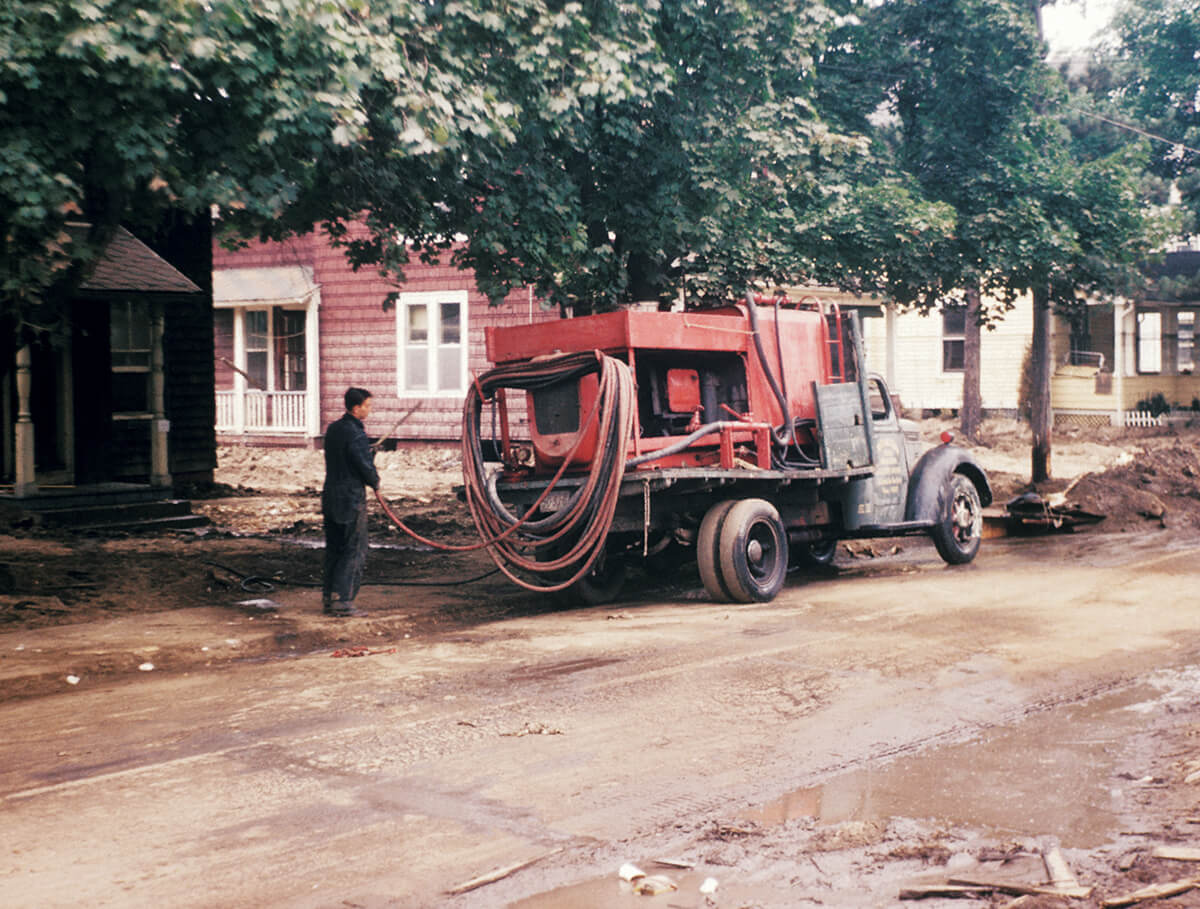 Field workers conduct a campaign of community tree spraying after a flood in Connecticut, 1955. Courtesy of the CDC Public Health Image Library. Image is in public domain. Field workers conduct a campaign of community tree spraying after a flood in Connecticut, 1955. Courtesy of the CDC Public Health Image Library. Image is in public domain.