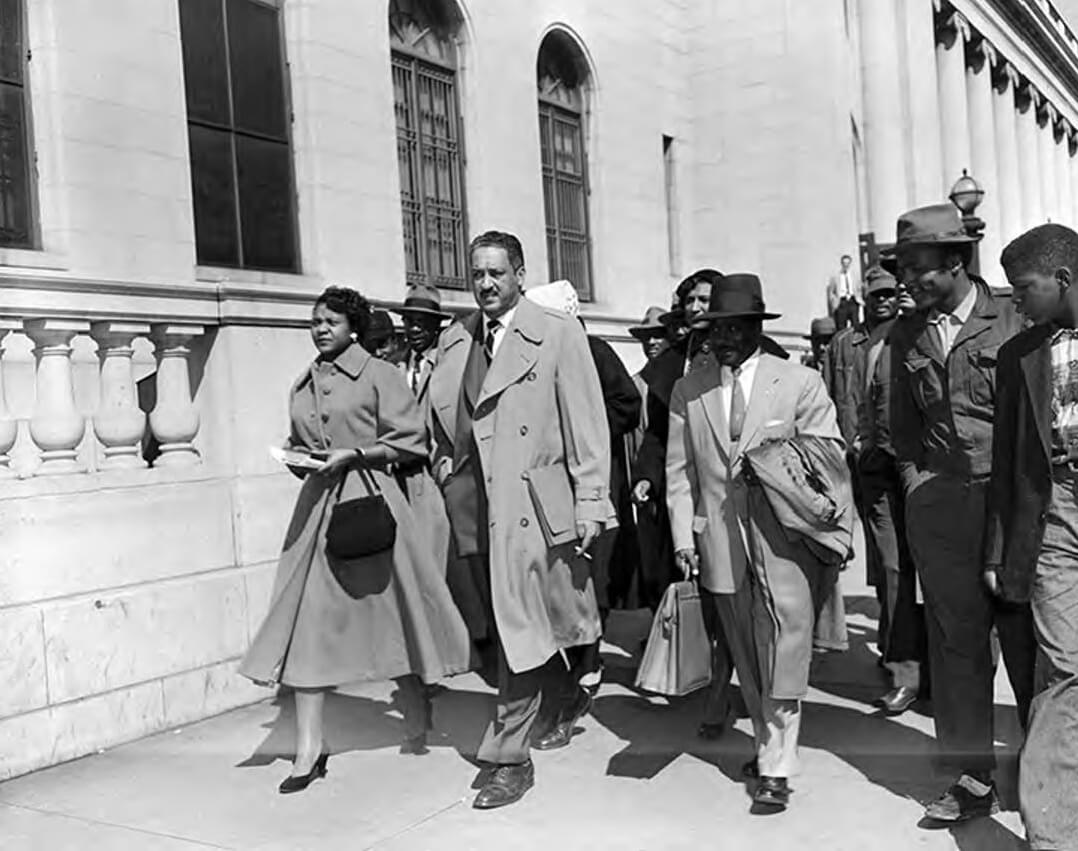 Autherine Lucy and her lawyers, Thurgood Marshall, Arthur Shores, and Constance Baker Motley, walking past the federal courthouse on the day a judge ordered her readmission to the University of Alabama, Birmingham, Alabama, February 29, 1956. Photograph by Norman Dean. Originally published in the Birmingham News. Courtesy of the Alabama Media Group Collection, Alabama Department of Archives and History.