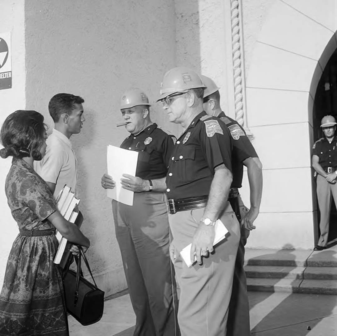 State troopers preventing Henry Hobdy and Dorothy Davis from entering Murphy High School, Mobile, Alabama, September 9, 1963. Photograph by unknown creator. Originally published in the Mobile Press-Register. Courtesy of the Alabama Media Group Collection, Alabama Department of Archives and History.