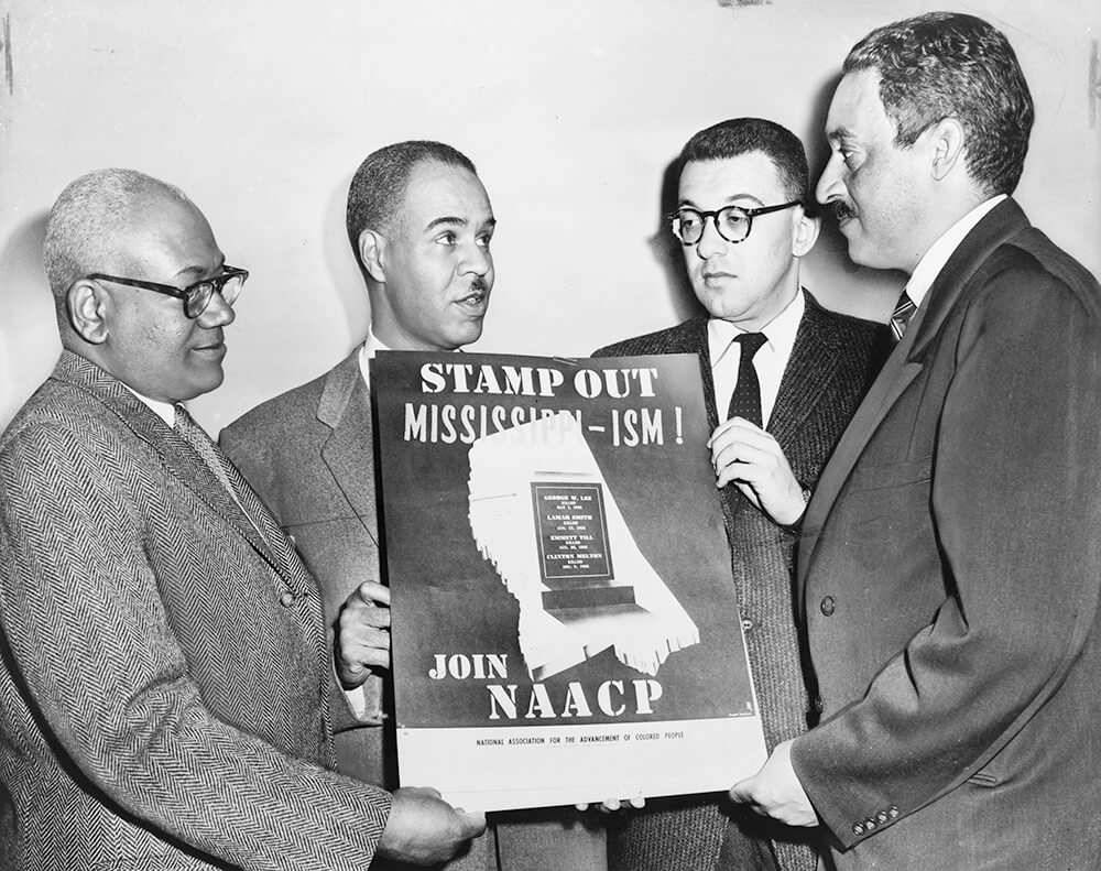 Stamp out Mississippi-ism, Join NAACP, 1956. Photograph by Al Ravenna. From left: Henry L. Moon, director of public relations; Roy Wilkins, executive secretary; Herbert Hill, labor secretary, and Thurgood Marshall, special counsel. Courtesy of the Library of Congress Prints and Photographs Division, loc.gov/pictures/item/99401448.