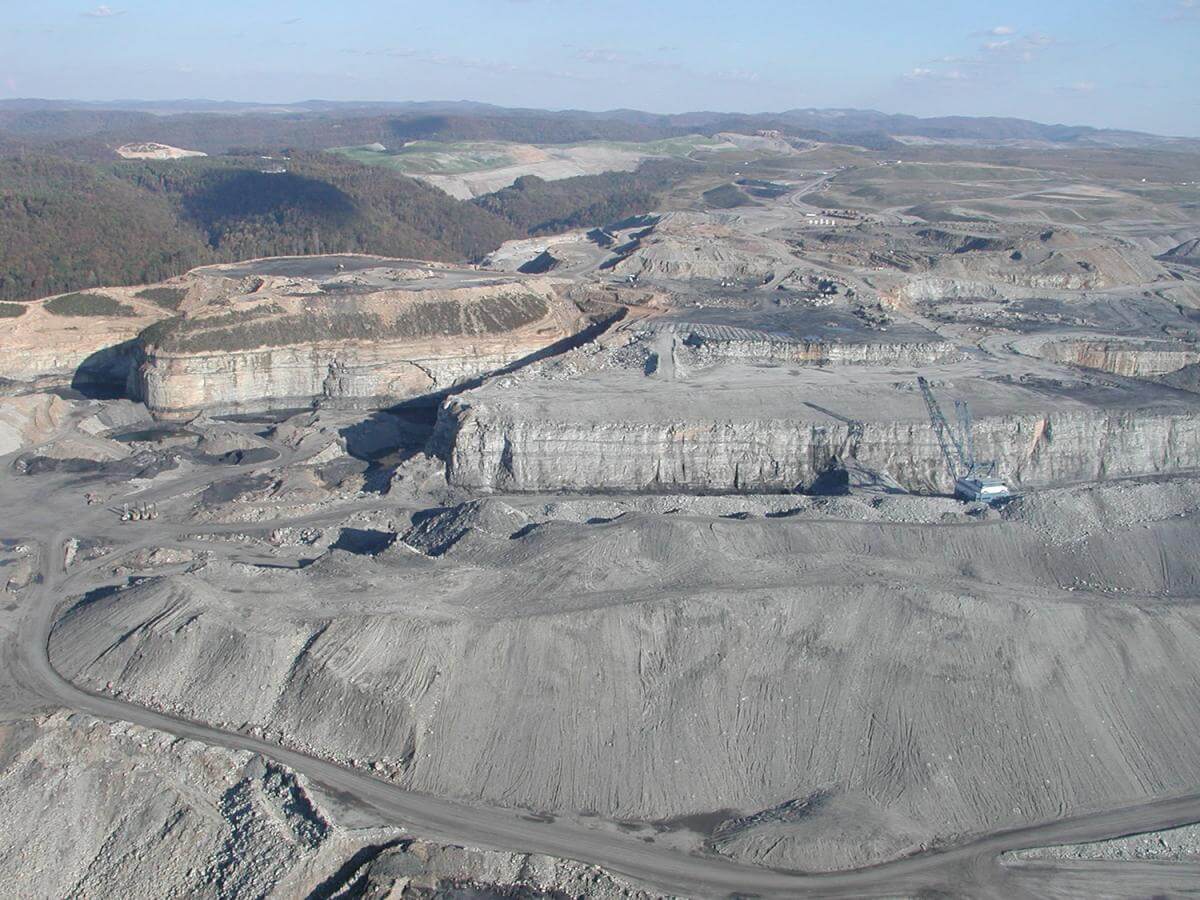 Mountaintop Removal Mine on Kayford Mountain, Kayford, West Virginia, ca. 2005. Photograph by Vivian Stockman. Courtesy of Ann Pancake. An aerial photograph of a mountaintop removal mine, showing vast expanses of bare, rocky, excavated earth.