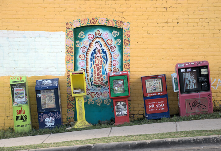 Mural on the side of El Milagro, popular tortilla makers located on the corner of E 6th St and San Marcos St in East Austin. Founded by Mexican immigrant and local tortilla specialist Raul Lopez, El Milagro has been an Austin fixture since 1950. Photograph by Flickr user jamesconradshea (CC BY-NC-SA 2.0). Mural on the side of El Milagro, popular tortilla makers located on the corner of E 6th St and San Marcos St in East Austin. Founded by Mexican immigrant and local tortilla specialist Raul Lopez, El Milagro has been an Austin fixture since 1950. Photograph by Flickr user jamesconradshea (CC BY-NC-SA 2.0).