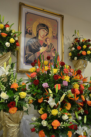Our Lady of Perpetual Help, Marian Shrine at the Notre Dame d'Haiti Catholic Church, Miami, Florida, February 1, 2014. Photo by Ana Rodriguez-Soto. Courtesy of the Archdiocese of Miami.  Our Lady of Perpetual Help, Marian Shrine at the Notre Dame d'Haiti Catholic Church, Miami, Florida, February 1, 2014. Photo by Ana Rodriguez-Soto. Courtesy of the Archdiocese of Miami.