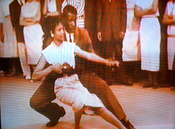 Vera Boyer and Otis Givens show off their dance steps on The Mitch Thomas Show, Wilmington, Delaware, ca. 1956-57. Screen shot from  Vera Boyer and Otis Givens show off their dance steps on The Mitch Thomas Show, Wilmington, Delaware, ca. 1956-57. Screen shot from