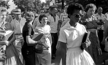 Hazel Bryan (left) harasses Elizabeth Eckford as Eckford and other black students attempt to integrate Little Rock's Central High School, Little Rock, Arkansas, September 4, 1957. Courtesy of Matthew F. Delmont. Hazel Bryan (left) harasses Elizabeth Eckford as Eckford and other black students attempt to integrate Little Rock's Central High School, Little Rock, Arkansas, September 4, 1957. Courtesy of Matthew F. Delmont.
