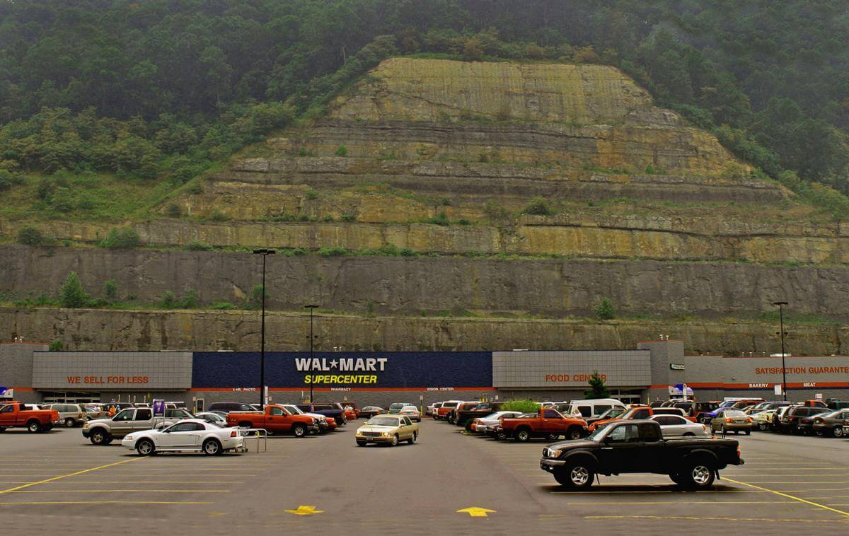 Walmart, situated in a shopping center several miles from downtown Logan on a strip mine bench, 2005. Walmart, situated in a shopping center several miles from downtown Logan on a strip mine bench, 2005.
