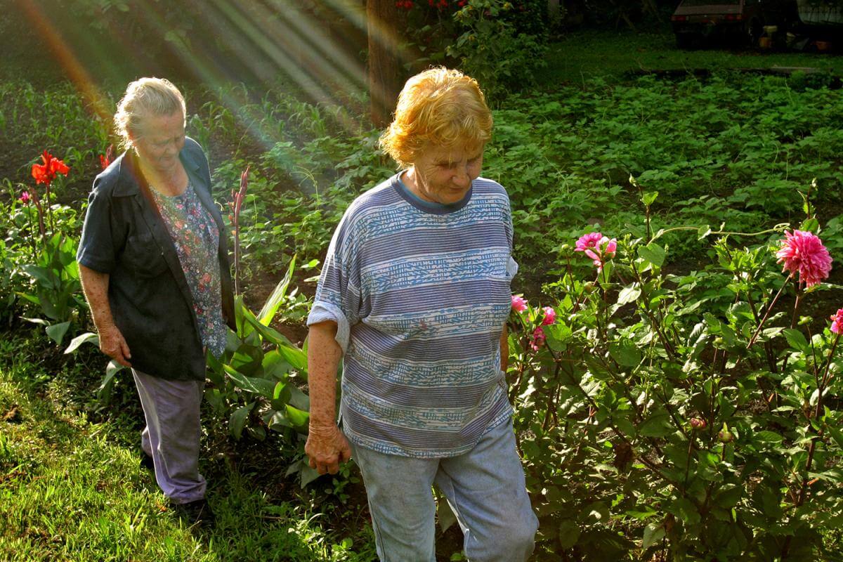 Sisters, in the glory of their garden. Letcher County, KY, 2005. Sisters, in the glory of their garden. Letcher County, KY, 2005.
