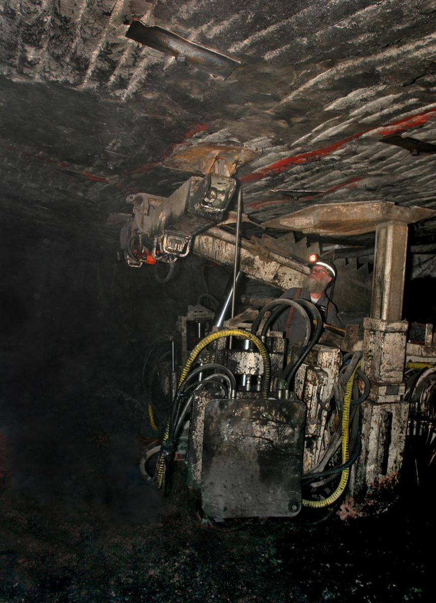 Roof bolting machine provides hydraulic support for mine roof and miners. Boone County, WV, 2005. Roof bolting machine provides hydraulic support for mine roof and miners. Boone County, WV, 2005.