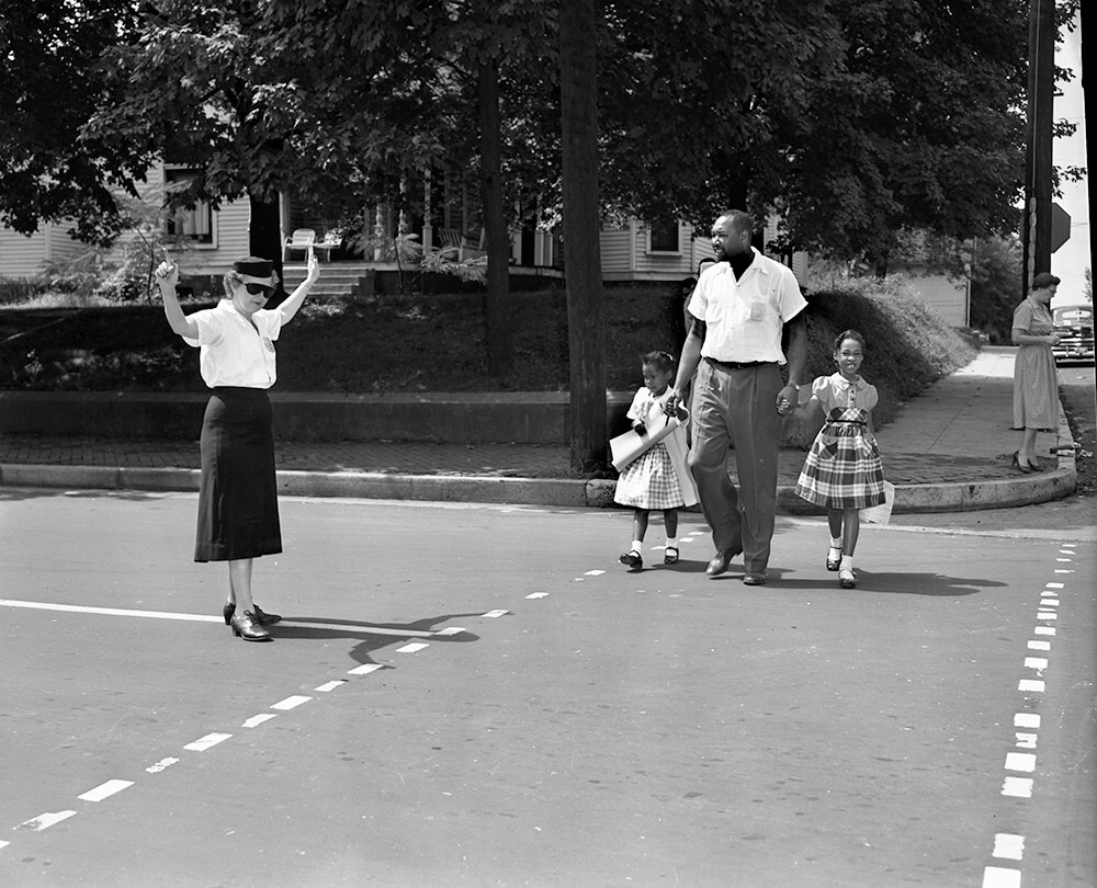 Harold Street walks his daughter Lajuanda (right) and Jacqueline Griffith (left) to Glenn Elementary School, Nashville, TN, September 1957. © Nashville Public Library. Harold Street walks his daughter Lajuanda (right) and Jacqueline Griffith (left) to Glenn Elementary School, Nashville, TN, September 1957. © Nashville Public Library.