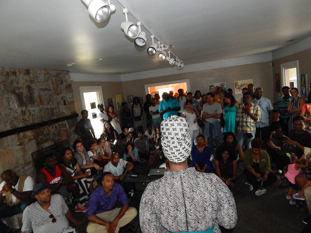 LiFT curator Shady speaks at the Hammonds House Museum, Atlanta, Georgia, July 12, 2015. Photograph by Clint Fluker. Courtesy of LiFT Art Salon.