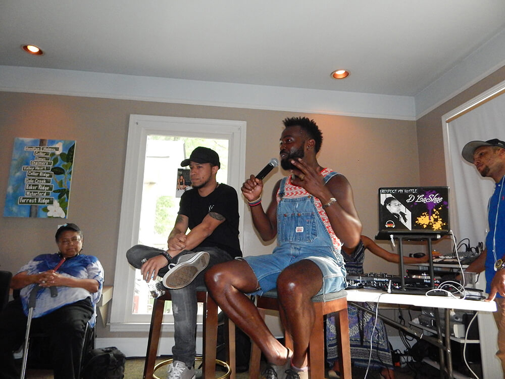 WERC Crew speaks to the crowd, Atlanta, Georgia, July 12, 2015. Photograph by Clint Fluker. Courtesy of LiFT Art Salon.