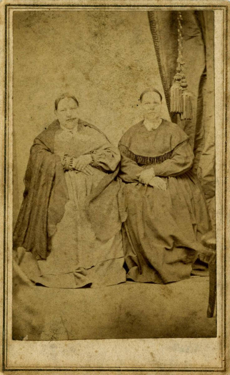 Adelaide Bunker and Sarah Bunker, ca. 1860–1870. Photograph by J. H. Blakemore. Photograph courtesy of the North Carolina Collection Photographic Archives, Louis Round Wilson Special Collections Library, University of North Carolina at Chapel Hill. Adelaide Bunker and Sarah Bunker, ca. 1860–1870. Photograph by J. H. Blakemore. Photograph courtesy of the North Carolina Collection Photographic Archives, Louis Round Wilson Special Collections Library, University of North Carolina at Chapel Hill.