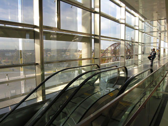 David Wharton, Guard and escalator at Clinton Library, Little Rock, Arkansas, 2006. David Wharton, Guard and escalator at Clinton Library, Little Rock, Arkansas, 2006.