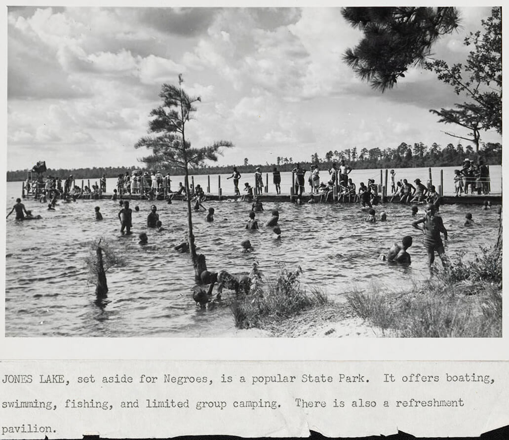 Jones Lake State Park, Bladen County, North Carolina, ca. 1940. Photograph by unknown creator, North Carolina Division of Parks and Recreation. Courtesy of the North Carolina Division of Parks and Recreation Records collection, State Archives of North Carolina, North Carolina Digital Collections, State Library of North Carolina.  Jones Lake State Park, Bladen County, North Carolina, ca. 1940. Photograph by unknown creator, North Carolina Division of Parks and Recreation. Courtesy of the North Carolina Division of Parks and Recreation Records collection, State Archives of North Carolina, North Carolina Digital Collections, State Library of North Carolina.