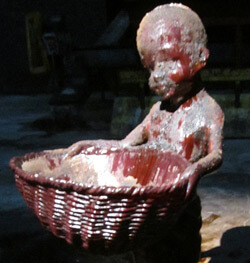 Child carrying basket inside Kara Walker's A Subtlety, Brooklyn, New York, 2014. Photograph by Valérie Loichot. Courtesy of Valérie Loichot. Child carrying basket inside Kara Walker's A Subtlety, Brooklyn, New York, 2014. Photograph by Valérie Loichot. Courtesy of Valérie Loichot.