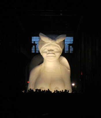 Click to load interactive 3-D model of the Sugar Baby sphinx, from Creative Time. © 2014 Creative Time. Photograph of sphinx, Brooklyn, New York, 2014. Photograph by Valérie Loichot. Courtesy of Valérie Loichot. Click to load interactive 3-D model of the Sugar Baby sphinx, from Creative Time. © 2014 Creative Time. Photograph of sphinx, Brooklyn, New York, 2014. Photograph by Valérie Loichot. Courtesy of Valérie Loichot.