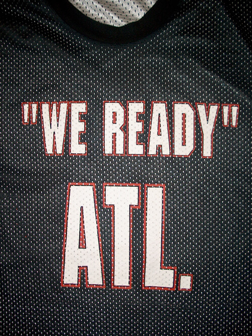 Image of Atlanta rap slogan “‘We Ready’ ATL.” on a basketball jersey. Photograph by Matt Miller, 2007. Courtesy of Matt Miller. Image of Atlanta rap slogan “‘We Ready’ ATL.” on a basketball jersey. Photograph by Matt Miller, 2007. Courtesy of Matt Miller.
