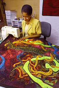 Gwen Magee at work on her abstract design Bolero. Photography by J.D. Schwalm and The Clarion-Ledger, 2001.  Gwen Magee at work on her abstract design Bolero. Photography by J.D. Schwalm and The Clarion-Ledger, 2001.