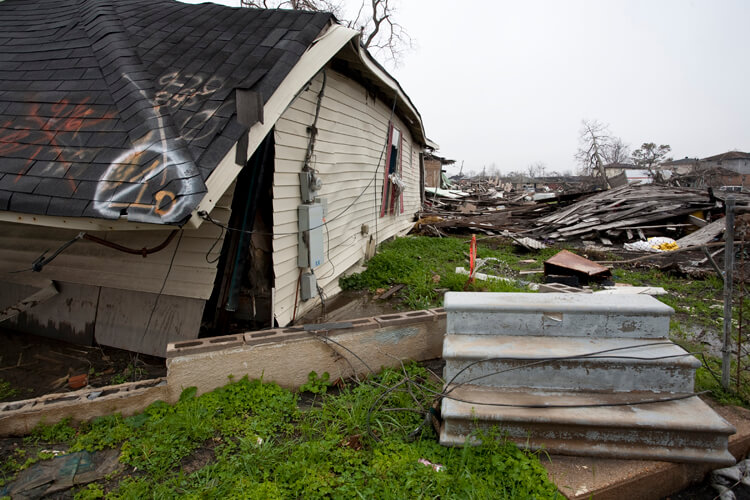 New Orleans, Louisiana, February 2006. Photograph by Stewart Harvey. Codes are marked on the collapsed roof of this demolished house. © Stewart Harvey.  New Orleans, Louisiana, February 2006. Photograph by Stewart Harvey. Codes are marked on the collapsed roof of this demolished house. © Stewart Harvey.