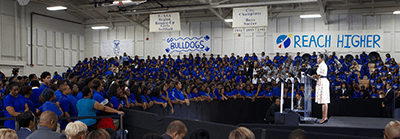 Michelle Obama speaks to students at Booker T. Washington High School, Atlanta, Georgia, August 8, 2014. Photograph courtesy of the US Department of Education, CC BY. School districts in historically black areas of the Atlanta metro region remain highly segregated. Michelle Obama speaks to students at Booker T. Washington High School, Atlanta, Georgia, August 8, 2014. Photograph courtesy of the US Department of Education, CC BY. School districts in historically black areas of the Atlanta metro region remain highly segregated.