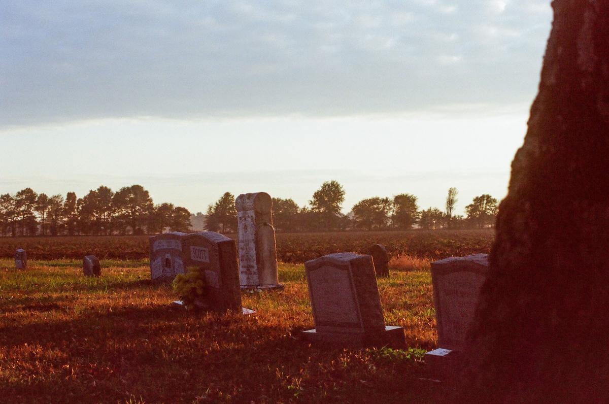 Scott family gravestones, Leflore County, Mississippi, 2013. Photograph by Julian Rankin. © Julian Rankin. Scott family gravestones in a grassy field