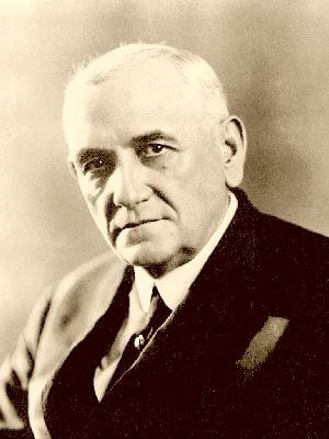 Former Louisiana Governor Henry L. Fuqua, 1924. Photograph by unknown creator. Courtesy of Wikimedia Commons and the National Governors Association. Image is in public domain. Sepia-toned photographic portrait of a man in a suit and tie.