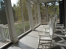 The porch at Andalusia, Flannery O'Connor's home in Milledgeville, Georgia. Photograph by pdoyen, November 12, 2008. Courtesy of pdoyen. The porch at Andalusia, Flannery O'Connor's home in Milledgeville, Georgia. Photograph by pdoyen, November 12, 2008. Courtesy of pdoyen.