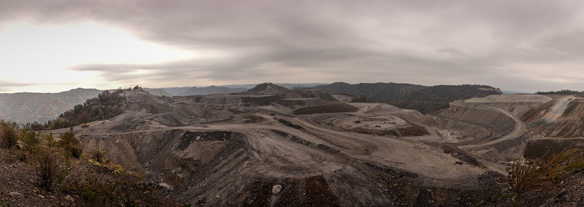 Mountaintop coal mine, Charleston, West Virginia, October 16, 2008. Photograph by Flickr user ddimick. Creative Commons license CC BY-NC 2.0. Cropped from original.  Mountaintop coal mine, Charleston, West Virginia, October 16, 2008. Photograph by Flickr user ddimick. Creative Commons license CC BY-NC 2.0. Cropped from original.