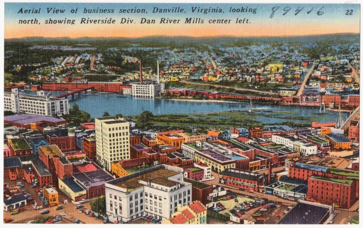 Aerial view of Business Section, Danville, Virginia, looking north, showing Riverside Div. Dan River Mills center left, 1930–1945. Courtesy of The Tichnor Brothers Collection, Boston Public Library. Creative Commons license CC BY 2.0. Aerial view of Business Section, Danville, Virginia, looking north, showing Riverside Div. Dan River Mills center left, 1930–1945. Courtesy of The Tichnor Brothers Collection, Boston Public Library. Creative Commons license CC BY 2.0.