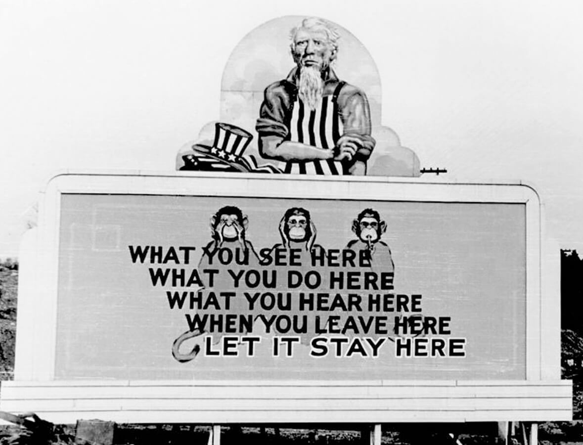 Billboard encouraging secrecy amongst Oak Ridge workers, Oak Ridge, TN, ca. 1940s. Photo by Ed Westcott. Courtesy of Wikimedia Commons. Image is in public domain. Billboard encouraging secrecy amongst Oak Ridge workers, Oak Ridge, TN, ca. 1940s. Photo by Ed Westcott. Courtesy of Wikimedia Commons. Image is in public domain.