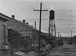 St. Thomas Street: the before photo. View shows street view prior to the demolition that cleared the area for the St. Thomas Housing Project. New Orleans, Louisiana, circa 1939. Photograph by US Housing Authority. National Archives and Records Administration, 196086. St. Thomas Street: the before photo. View shows street view prior to the demolition that cleared the area for the St. Thomas Housing Project. New Orleans, Louisiana, circa 1939. Photograph by US Housing Authority. National Archives and Records Administration, 196086.