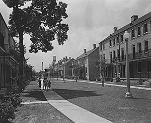 St. Thomas Street: the after photo. View shows completed St. Thomas Housing Project, circa 1940–1941. Photograph by US Housing Authority. National Archives and Records Administration, 196087. St. Thomas Street: the after photo. View shows completed St. Thomas Housing Project, circa 1940–1941. Photograph by US Housing Authority. National Archives and Records Administration, 196087.